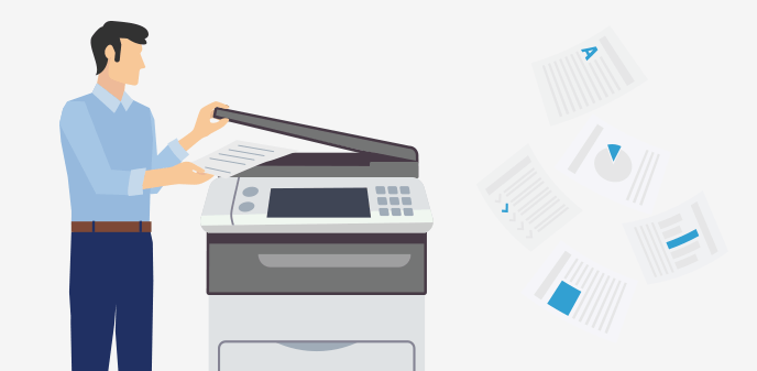 コピー機のガラス面に原稿をセットする様子