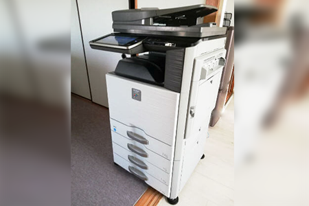 株式会社青山通運様の複合機納品レポート